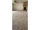 Spacious living room with carpet flooring and stone fireplace at 125 Laney Ct, Mcdonough, GA 30252