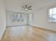 Bright bedroom with hardwood floors and ceiling fan at 150 Dockside Dr # 382, Fayetteville, GA 30215