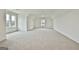 Spacious bonus room with carpet, two windows, and recessed lighting at 150 Dockside Dr # 382, Fayetteville, GA 30215