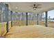 Covered deck with wooden flooring and gray railings at 150 Dockside Dr # 382, Fayetteville, GA 30215