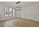 Formal dining room with hardwood floors and chandelier at 150 Dockside Dr # 382, Fayetteville, GA 30215