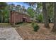 Charming two-story brick home with a well-kept lawn and mature trees at 470 Dix Lee On Dr, Fayetteville, GA 30214