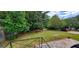 Expansive backyard with mature trees, picnic table, and potential for outdoor activities at 2704 Gresham Se Rd, Atlanta, GA 30316