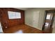 Bedroom with hardwood floors and a window providing natural light, creating a cozy and inviting space at 2704 Gresham Se Rd, Atlanta, GA 30316