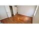 A comfortable bedroom featuring hardwood floors, ample closet space, and a window for natural light at 2704 Gresham Se Rd, Atlanta, GA 30316