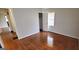 Bright bedroom showcasing beautiful hardwood floors and closet space at 2704 Gresham Se Rd, Atlanta, GA 30316