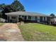Charming single-story home with a well-manicured lawn and cozy curb appeal, inviting you to call it home at 2704 Gresham Se Rd, Atlanta, GA 30316
