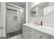 Bathroom showcasing a glass-enclosed shower, decorative tile, and a modern vanity with sink at 3140 Jackson Creek Dr, Stockbridge, GA 30281
