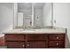 Bathroom featuring a granite countertop vanity and a large mirror at 3140 Jackson Creek Dr, Stockbridge, GA 30281