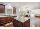 Kitchen with granite countertops, stainless steel appliances, and a large island at 3140 Jackson Creek Dr, Stockbridge, GA 30281