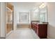 Bright bathroom features double vanity, granite counters, soaking tub and tiled shower at 3140 Jackson Creek Dr, Stockbridge, GA 30281