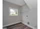 Bright laundry room features a window, shelving, and space for appliances at 585 Highway 155 North N, Mcdonough, GA 30252
