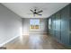 Bright bedroom with hardwood floors and a large window at 170 Paislee Park (Lot #8 Paislee Park) Dr, Fayetteville, GA 30215