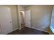 Bedroom with two closets and carpeted floors at 5300 Forest Downs Ln, Atlanta, GA 30349