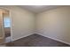 Neutral bedroom features carpet floors and neutral walls at 5300 Forest Downs Ln, Atlanta, GA 30349