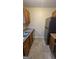 Well-equipped kitchen with stainless steel refrigerator and modern appliances at 5300 Forest Downs Ln, Atlanta, GA 30349