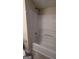 Shower with white wall surround at 5300 Forest Downs Ln, Atlanta, GA 30349