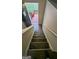 Carpeted staircase leading up to the front door and deck at 5300 Forest Downs Ln, Atlanta, GA 30349