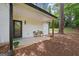 Private outdoor patio with seating, perfect for relaxing and entertaining at 1928 Wildwood Dr, Decatur, GA 30032