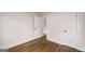 The bedroom features hardwood floors and natural light through the windows at 2013 Marco Dr, Decatur, GA 30032