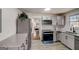 The kitchen features stainless steel appliances, granite countertops, and modern cabinetry at 2013 Marco Dr, Decatur, GA 30032