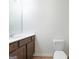 Clean half bathroom with a modern vanity and fixture at 4001 Avalon Sw Rd, Atlanta, GA 30331