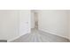 Bedroom features neutral carpet and white walls at 4001 Avalon Sw Rd, Atlanta, GA 30331