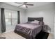 Inviting bedroom with hardwood floors, a plush bed, and ample natural light at 2700 Pine Ne St # 2108, Atlanta, GA 30324