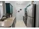 Updated kitchen featuring stainless steel appliances, modern fixtures, and sleek countertops at 2700 Pine Ne St # 2108, Atlanta, GA 30324