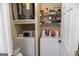 Functional laundry room with washer, dryer, shelving, and room for storage at 2700 Pine Ne St # 2108, Atlanta, GA 30324