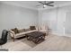 Comfortable living room with a ceiling fan, neutral decor, and bright natural light at 2700 Pine Ne St # 2108, Atlanta, GA 30324
