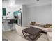 Open-concept living space with kitchen, breakfast bar, and living room with modern decor at 2700 Pine Ne St # 2108, Atlanta, GA 30324