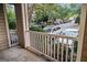 View from a quiet porch surrounded by lush greenery and overlooking the parking lot at 2700 Pine Ne St # 2108, Atlanta, GA 30324