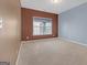 Bedroom with carpet, light, and different colored walls at 4424 Bellwood Cir, Atlanta, GA 30349