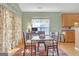 Cozy dining area with a window and hardwood floors at 4424 Bellwood Cir, Atlanta, GA 30349