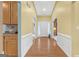 Elegant foyer with gleaming wood floors and classic white trim at 4424 Bellwood Cir, Atlanta, GA 30349