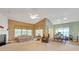 Open-concept living room featuring a fireplace and natural light at 4424 Bellwood Cir, Atlanta, GA 30349