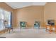 Cozy living room featuring hardwood floor, comfortable seating, and ample natural light at 4424 Bellwood Cir, Atlanta, GA 30349