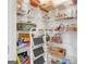 Well-organized walk-in pantry with white wire shelving and ample storage at 4424 Bellwood Cir, Atlanta, GA 30349