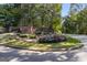 Stonecrest Heights community entrance with brick signage and landscaping at 2783 Parkway Cv, Lithonia, GA 30058