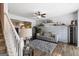 Inviting living room with a ceiling fan, a comfortable sofa, and stylish decor at 2783 Parkway Cv, Lithonia, GA 30058