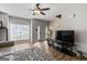 Bright and airy living room with lots of natural light, featuring sleek wood floors at 2783 Parkway Cv, Lithonia, GA 30058