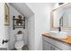 Stylish bathroom with a modern vanity and floating shelves at 4392 Lower Fayetteville Rd, Sharpsburg, GA 30277