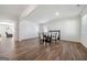 Bright dining room with hardwood floors, neutral paint, and modern furnishings at 2715 Serena Way, Atlanta, GA 30331