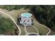 Aerial view of house, pool, and walking paths in a quiet community at 140 Dockside Dr # 381, Fayetteville, GA 30215