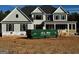 New two-story home with gray siding and a covered porch at 140 Dockside Dr # 381, Fayetteville, GA 30215