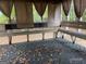 A wooden back porch with seating provides a relaxing outdoor space at 2177 E Chester Cir, Conyers, GA 30013