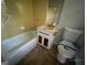 The bathroom features a combination tub and shower, along with a vanity and tile flooring at 2177 E Chester Cir, Conyers, GA 30013