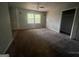 Bedroom with neutral carpet, closet and built-in shelving unit at 2177 E Chester Cir, Conyers, GA 30013