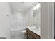 Bathroom boasts a tub and shower combination, tile flooring, and a vanity with stone countertops at 527 Bohannon Rd # 12, Grantville, GA 30220